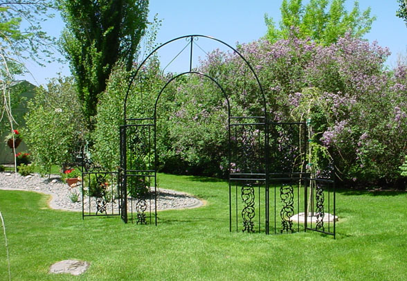 Black Iron Arch has elegant designs in iron to decorate any yard