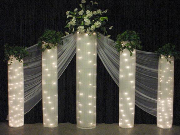 Column backdrop add a soft glow to your reception